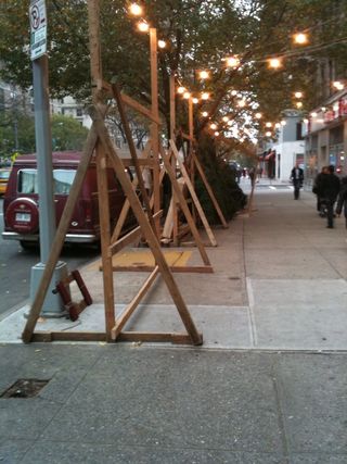 Winter tree sacrifice underway in NYC.