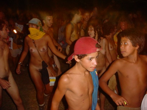 cute nude woman in crowd and wearing a veil