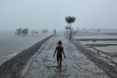 Villagers along the southern coast of Bangladesh not only have to cope with some of the world's heaviest rainfall; they also live in cyclone-battered communities, on mushy ground just a few feet above a rising sea.