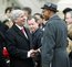 Detroit Mayor Dave Bing (right), greeting Michigan Gov. Rick Snyder at his Jan. 1 inauguration, does not agree with the governor's idea of a state takeover of his troubled city. "We know what needs to be done, and we stand ready to do it," Mr. Bing said. (Associated Press)