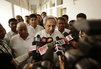 ** FILE ** Orissa state Chief Minister Naveen Patnaik (center) speaks to the media at the state Assembly House in Bhubaneswar, India, on Wednesday, March 21, 2012. (AP Photo/Biswaranjan Rout)

