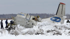 Russian investigators search the site of the UTair ATR-72 plane crash outside Tyumen, in Siberia, Russia, on April 2, 2012.