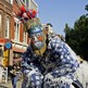 One of the Free Spirit Stilt Walker's poses for the camera during the KUUMBA Festival on Market Square Friday, June 29, 2012 in Knoxville, Tenn. (Photo by Wade Payne, Special to the News Sentinel)