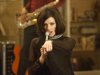 This image released by AMC shows Jessica Pare as Megan Draper performing a French song in a scene from the season five premiere episode of "Mad Men," where Megan surprises her husband Don with a birthday party.  On Thursday, July 19, 2012, the program received a total of 17 Emmy nominations including best actress in a drama series for Elisabeth Moss and best actor for Jon Hamm. The 64th annual Primetime Emmy Awards will be presented Sept. 23 at the Nokia Theatre in Los Angeles, hosted by Jimmy Kimmel and airing live on ABC. (AP Photo/AMC, Ron Jaffe)