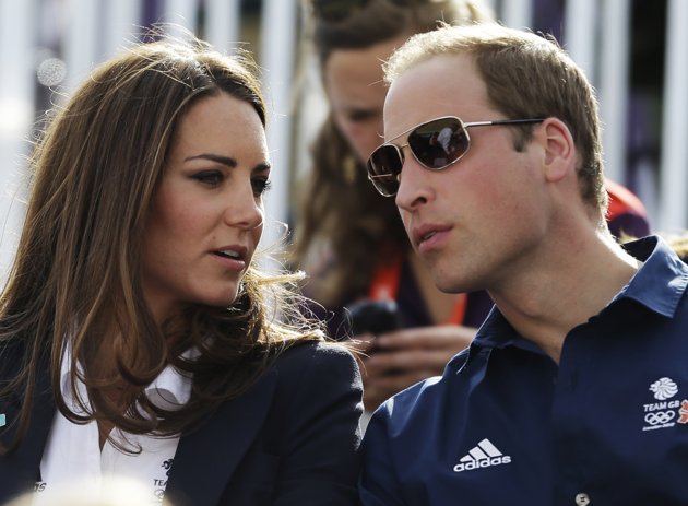 Britain's Catherine, Duchess of Cambridge, and Britain's Prince William, the Duke of Cambridge, watch the equestrian eventing cross country phase at the 2012 Summer Olympics, Monday, July 30, 2012, in