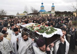Russian Orthodox Christians mourners at a funeral procession