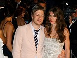 Cooking up a fortune: Jamie Oliver, pictured with his wife Jools, has come second in the list of the top 50 most valuable authors compiled by The Bookseller
