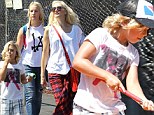 Putting themselves about! Gwen Stefani takes her boys on crazy golf adventure