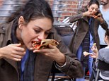 Mila Kunis eats pizza on break from her new film The Angriest Man in Brooklyn on Tuesday, September 11 