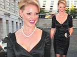 Katherine Heigl shows off her considerable assets in a VERY low cut dress as she attends charity event 