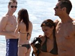 Smokin! Serial dater Jim Carrey premieres his new bikini-clad girlfriend on Malibu beach 