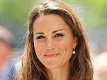Frizz attack! The Duchess of Cambridge pictured on day 2 of the Diamond Jubilee Tour of the Far East