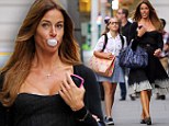 Grow up Mom! Kelly Bensimon blows bubbles as her daughter Thaddeus looks on in disapproval