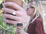 Kirsten Dunst steps out sporting a rather large diamond ring on her finger