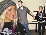 Curvy Christina Aguilera dresses for comfort in her favourite leggings on date night with boyfriend