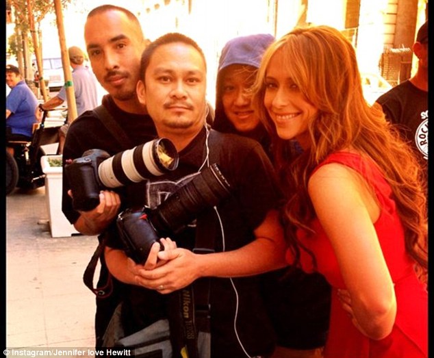 Snap happy: She posed for a picture with the paparazzi who joined her in Los Angeles