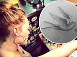 New mother Hilary Duff revisits her wild side by getting her SIXTH tattoo