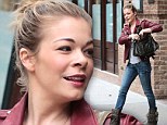 Not even LeAnn Rimes' heavy make-up can hide her puffy eyes after emotional week