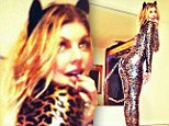 Nice kitty! Halloween comes early for Fergie as she show's off leopard costume
