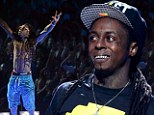 Lil Wayne hospitalised after suffering 'seizure-like symptoms' during a flight
