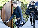 Miley Cyrus ensures she gets noticed in bizarre outfit... but it doesn't stop her getting locked out of recording studio