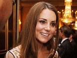 Catherine, Duchess of Cambridge aka Kate Middleton smiles as she talks to Olympic and Paralympic Athletes during a reception for Team GB Medallists at the 2012 Olympic and Paralympic Games at Buckingham Palace
