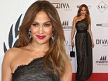 Where's Casper? Jennifer Lopez goes solo at charity gala after gushing messages with toyboy to mark their one-year anniversary 