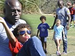 It's Daddy's turn! Doting Seal takes three oldest children to football and proudly films the game