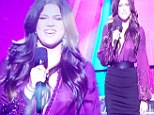 What a way to make an entrance! Khloe Kardashian exposes her nipple in a sheer blouse as she hosts her very first live X Factor USA show 