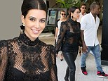Kim Kardashian is not the only one laughing... as she slips into frightful leather and lace outfit ahead of Halloween party