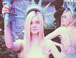 Elle Fanning dressed as the Statue of Liberty for Halloween this year