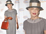 Bag lady: Sharon Stone looked a bit dowdy as she attended the Lupus LA Hollywood Bag Ladies Luncheon in Beverly Hills