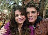What would Justin say? Selena Gomez cuddles up to her hunky Wizard of Waverly Place co-star as pair film reunion movie 