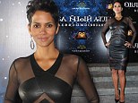 Stunning: Halle Berry wore an eye-catching black leather and semi-sheer dress at the Moscow premiere of her new movie Cloud Atlas