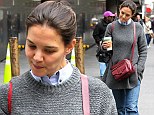 Showing the strain: Katie Holmes looked tired as she emerged in New York on Thursday after Superstorm Sandy 