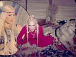 Yeehaw! Gwen Stefani dresses as a Native American, cavorts with a wolf, and ends up handcuffed in No Doubt's new Wild West themed music video