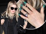 Halloween is over Fergie! Singer keeps scary theme going with her goblin-green pointy manicure
