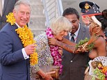 Prince Charles and Camilla, Duchess of Cornwall, presented with garlands