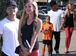 They're a match: Ryan Phillippe took over father duties at his son Deacon's soccer match on Saturday, and his girlfriend Paulina Slagter came along