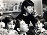 Nigella, far left, says she had a funny but depressed mother (pictured on phone), seen here with Nigel Lawson and daughter Thomasina