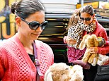 Weathering on after Sandy: Katie Holmes returns to work on Broadway with daughter Suri by her side