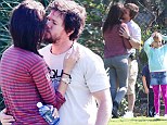 Make-out session: Mark Wahlberg and his wife, Rhea Durham, got in plenty of PDA during their son's soccer game on Saturday