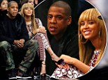 Date night: Beyonce and Jay-Z enjoyed time out from stormy weather at a basketball game on Saturday night 