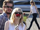 Everything's coming up roses: Emma Stone and Andrew Garfield took a Cemetery of the Stars Tour at the Hollywood Forever Cemetery in Los Angeles on Saturday