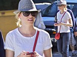 Keeping it under her hat: Elizabeth Banks is low key in tweed trilby, T-shirt and jeans for a leisurely day out at the Farmer's Market