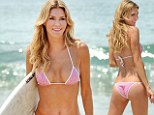 Riding on the crest of a wave: Real Housewives of Beverly Hills star Brandi Glanville,39, surfs in tiny gingham bikini
