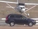Surprise landing: A small plane careened into an SUV at an airport in Dallas, Texas, on Saturday