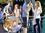 Happiest place on Earth: Bella Thorne shares ice-cream...and smooches with boyfriend Tristan Klier at Disneyland