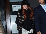 Front seat driver! Lindsay Lohan tries her hand at being a passenger... as she steps out in a mismatched outfit for night out