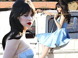 Feeling Blue: Zooey Deschanel poses with riding crop in powder blue vintage dress for photo shoot